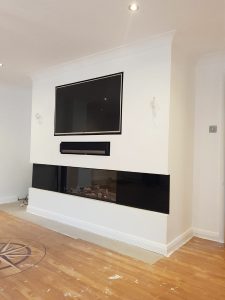 Dru Metro 100XT with black glass and tv above 2